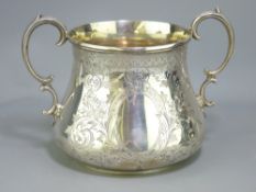 SILVER TWO-HANDLED SUGAR POT, London 1874, maker Thomas Smily, chased decorated body with vacant