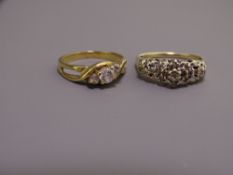 TWO 14 & 18CT GOLD DIAMOND SET RINGS, the 14ct with high openwork setting, holding 15 tiny diamonds,