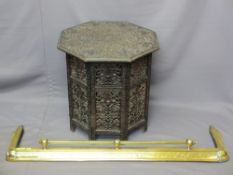 EASTERN CARVED HARDWOOD FOLDING TABLE, octagonal top with leaf and berry detail, repeated to the