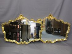 MODERN ROCOCO STYLE GILT FRAMED WALL MIRRORS, a pair, 80cms H, 106cms W