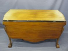 VINTAGE MAHOGANY SHAPED TOP DINING TABLE on carved knee supports with ball and claw feet (faded),