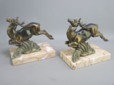 FRENCH ART DECO STYLE LEAPING STAG BOOK-ENDS, a pair, set on rectangular marble bases, 13cms H,
