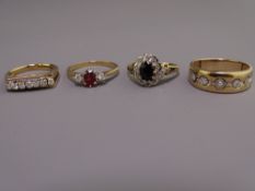 FOUR 9CT GOLD DIAMOND & SEMI-PRECIOUS STONE SET DRESS RINGS to include a wide band diamond set ring,