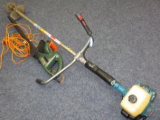 MAKITA PETROL STRIMMER with a Black and Decker electric hedge trimmer E/T