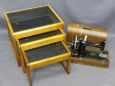 VINTAGE CASED SINGER SEWING MACHINE, three modern lightwood glass top tables and a magazine rack