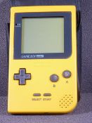NINTENDO GAMEBOY, yellow in colour with Super Mario Land cartridge and case (appears working)