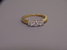 18CT GOLD THREE STONE DIAMOND RING size O-P white SI 0.20ct stones, 3.7grms