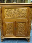ORIENTAL CARVED HARDWOOD COCKTAIL CABINET, various cupboards incorporated with lift lid and drop-