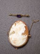 9CT GOLD AMETHYST SET BROOCH and a large oval cameo brooch, unmarked and untested