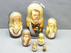 HAND PAINTED RUSSIAN NESTING DOLLS, set of seven, depicting Tsar Nicholas II and his family