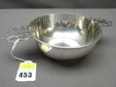 LARGE SILVER PORRINGER/QUAICHE, 22.5cms across with pierced handles, London 1922, makers Daniel