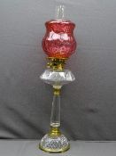 VICTORIAN STYLE OIL LAMP, mixed brass and glass column base with cut glass font and molded cranberry