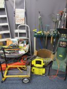 STORAGE STAND WITH GARDEN TOOLS, wheelbarrow, power tools ETC, Flymo garden vac, Black and Decker