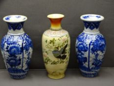 JAPANESE BLUE & WHITE VASES - 19th century, a pair, 30cms H and another similar sized floral and