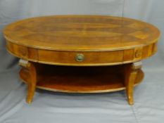 REPRODUCTION MAHOGANY OVAL CENTRE/COFFEE TABLE with central drawer and under-tier shelf, 51.5cms