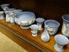 WEDGWOOD BLUE JASPERWARE including a 20cms D pedestal fruit bowl and 12 various style vases