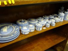 WEDGWOOD BLUE JASPERWARE, 25 pieces including a pair of lidded tea canisters, an oval plaque,