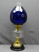BRASS & MIXED GLASS VICTORIAN OIL LAMP with black pot base, cut clear glass font and modern heavy
