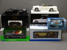 FIVE MINT & BOXED 1/18TH SCALE DIECAST VEHICLES including a Heinkel Trojan RHD in Roman Blue by