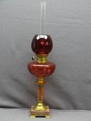 CIRCA 1900 OIL LAMP with brass and pink marble base, etched pattern cranberry font and modern ruby