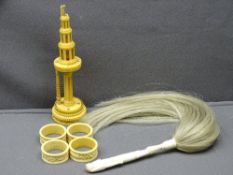 EARLY IVORY - Egyptian fly swish, napkin rings and an ornamental tower
