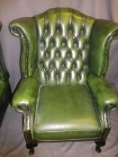 ANTIQUE STYLE BUTTON BACK GREEN LEATHER EFFECT WING BACK ARMCHAIR, 109cms H, 83cms W, 52cms seat D