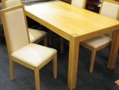 ULTRA MODERN LIGHT OAK DINING TABLE & FOUR CHAIRS having brown leather effect seat pads, 74.5cms