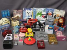NOVELTY RADIOS - a large quantity including Umbro football, shower radio ETC (three boxes)