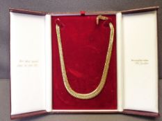 9CT GOLD GRADUATED DOUBLE FLAT LINK NECKLACE, 26.5grms gross in a velvet lined case (slight impact/