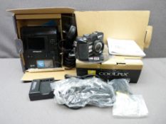 NIKON COOLPIX P5100 CAMERA and Polaroid Instant digital camera, Z340, both boxed with chargers E/T