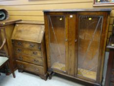 VINTAGE OAK LEAD GLAZED 'SUN-BURST' DISPLAY CABINET, together with an oak four drawer bureau with