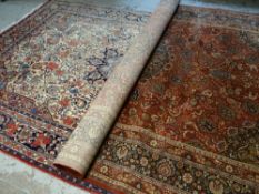 MAINLY BLUE GROUND MULTI FLORAL PATTERNED WOOLEN RUG with centre decoration and contrasting