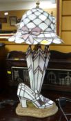 TIFFANY-STYLE TABLE LAMP in the form of a bonnet, umbrella and shoe