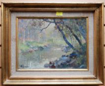 A STEVENS oil on board - river scene in woodland, signed, 22 x 29cms
