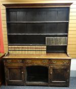 ANTIQUE WELSH DRESSER, dog kennel base, flanking cupboards, three drawers, boarded rack, 174cms