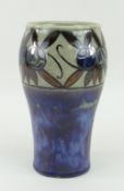 ROYAL DOULTON STONEWARE BALUSTER-STYLE VASE with floral decoration to the neck on a mainly blue