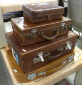 THREE ASSORTED SMALL LEATHER SUITCASES and another