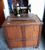 WOODEN CASED SEWING MACHINE, together with a small shelved cabinet