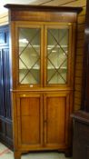ANTIQUE OAK STANDING CORNER CUPBOARD with two door glazed top and a two door cupboard base, 212cms