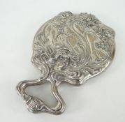 ART NOUVEAU STERLING SILVER BACKED VANITY MIRROR decorated in relief with flowers and female face