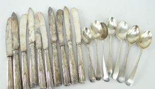 LOOSE PART-SET OF SILVER HANDLED KNIVES & SIMILAR TEASPOONS the teaspoons with monogrammed bowls,