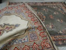 MAINLY GREEN GROUND BELGIAN WOOLEN RUG with oriental flower design and central rosette, 200 x