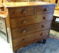 ANTIQUE MAHOGANY CHEST OF DRAWERS two short above three long, on raised turned feet, 112cms H x