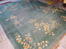 MAINLY GREEN CHINESE WOOLEN RUG, 390 x 312cms