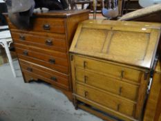 VINTAGE LIGHT OAK BUREAU with three drawers on raised feet, together with a stained pine chest of