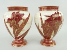 TWO SIMILAR RED & GILT DOULTON ART WARE BALUSTER VASES with impressed marks to base (2)