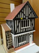 TUDOR-TYPE COTTAGE DOLL'S HOUSE with water wheel