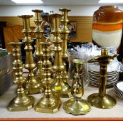 THREE PAIRS OF BRASS GRADUATED CANDLESTICKS ETC