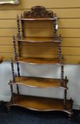 ANTIQUE ROSEWOOD WHAT-NOT with five graduated shelves, barley twist supports, pierced decorative