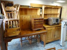 MODERN HONEY PINE DRESSER, hanging wall cupboard, together with a pine extending dining table and